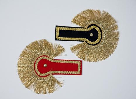 a pair of epaulettes:red 
