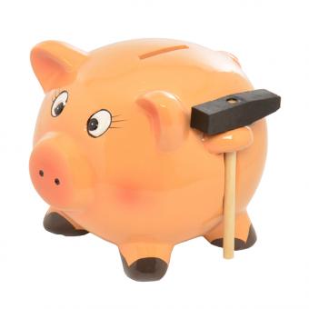 Money box pig with hammer 