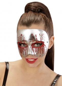 Silver mask with bloody eyes 